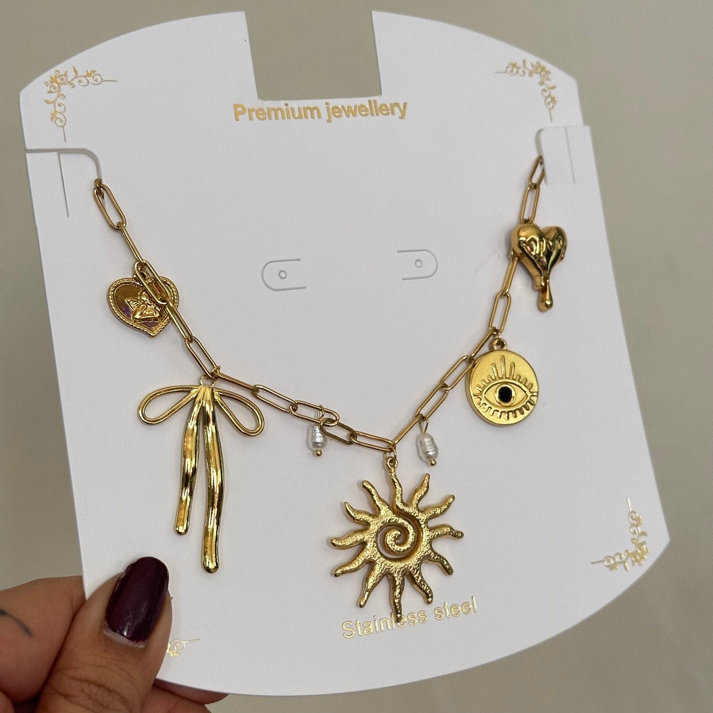 MULTI CHARM GOLD NECKLACE