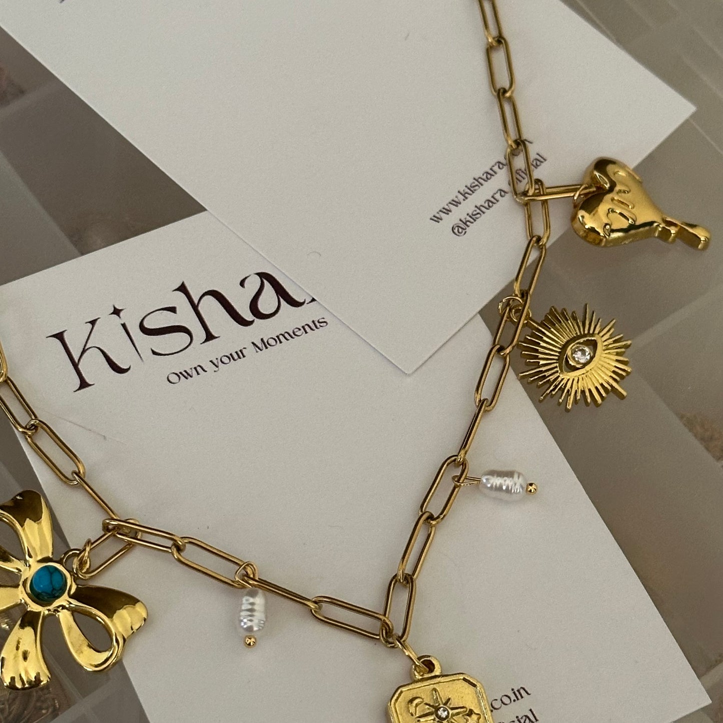 MULTI CHARM BOW HEART NECKLACE