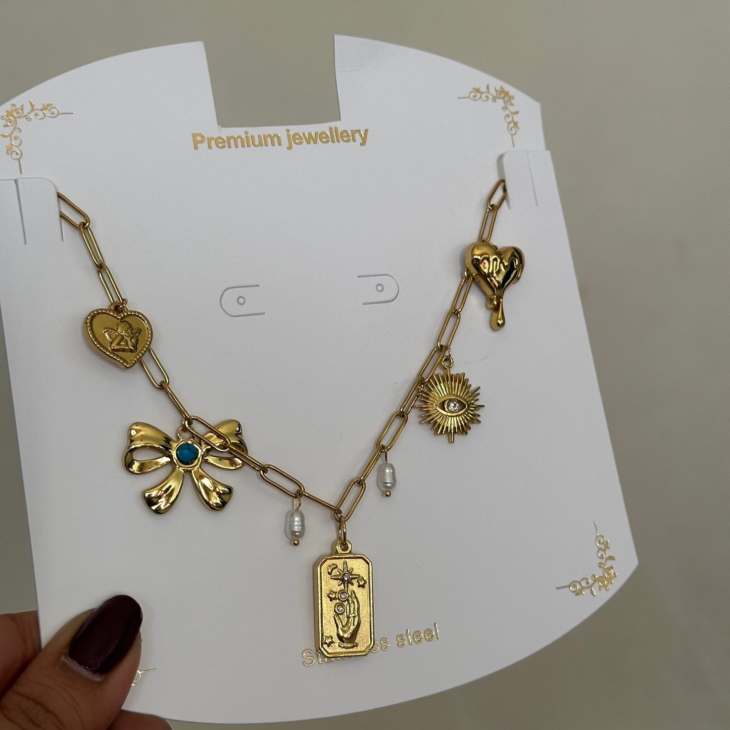 MULTI CHARM BOW HEART NECKLACE