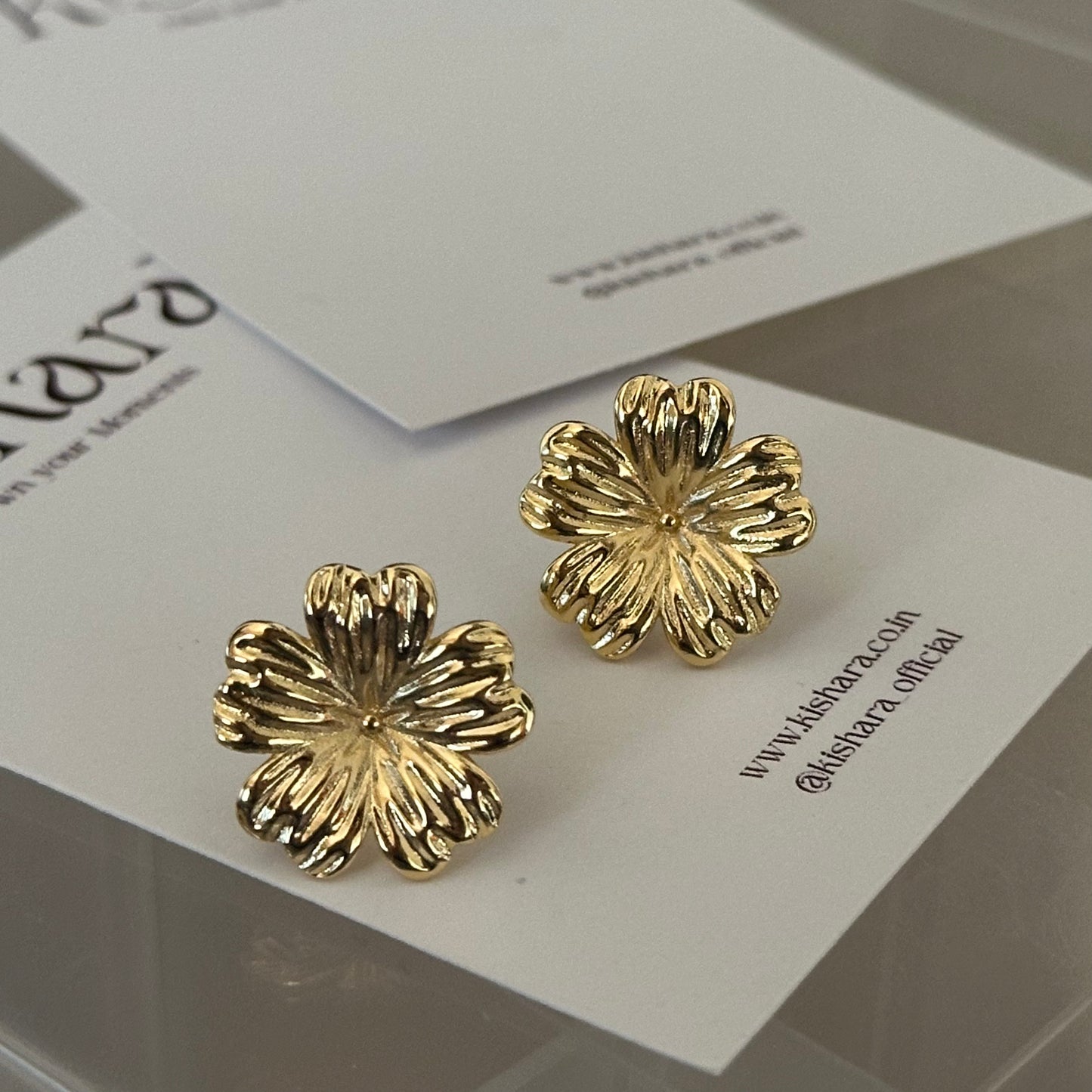 GOLD FLOWER STUDS
