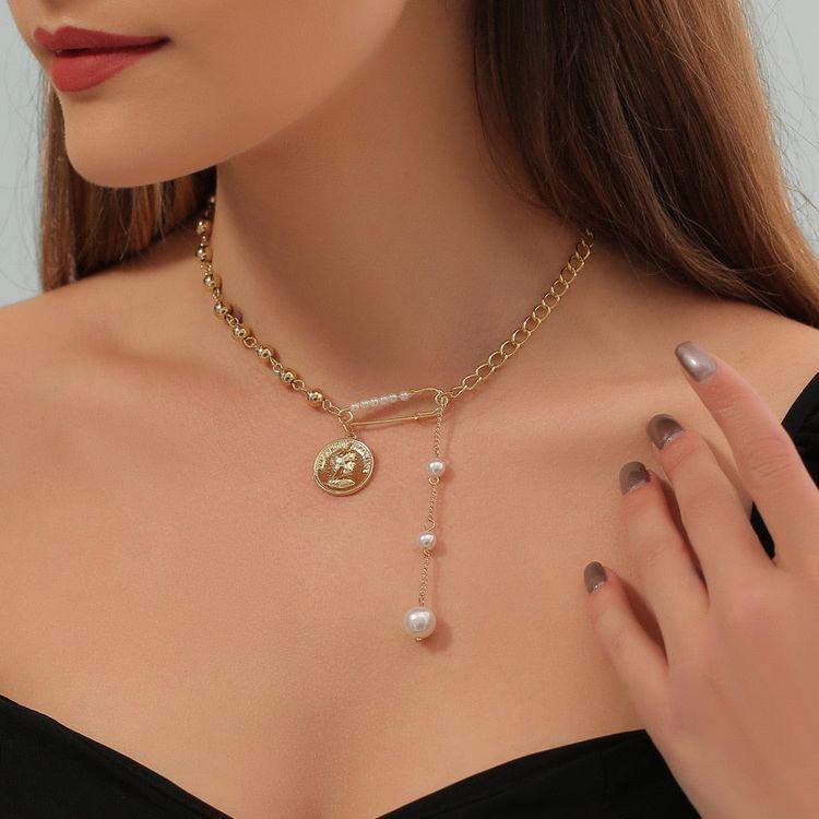 Safety pin pearl necklace