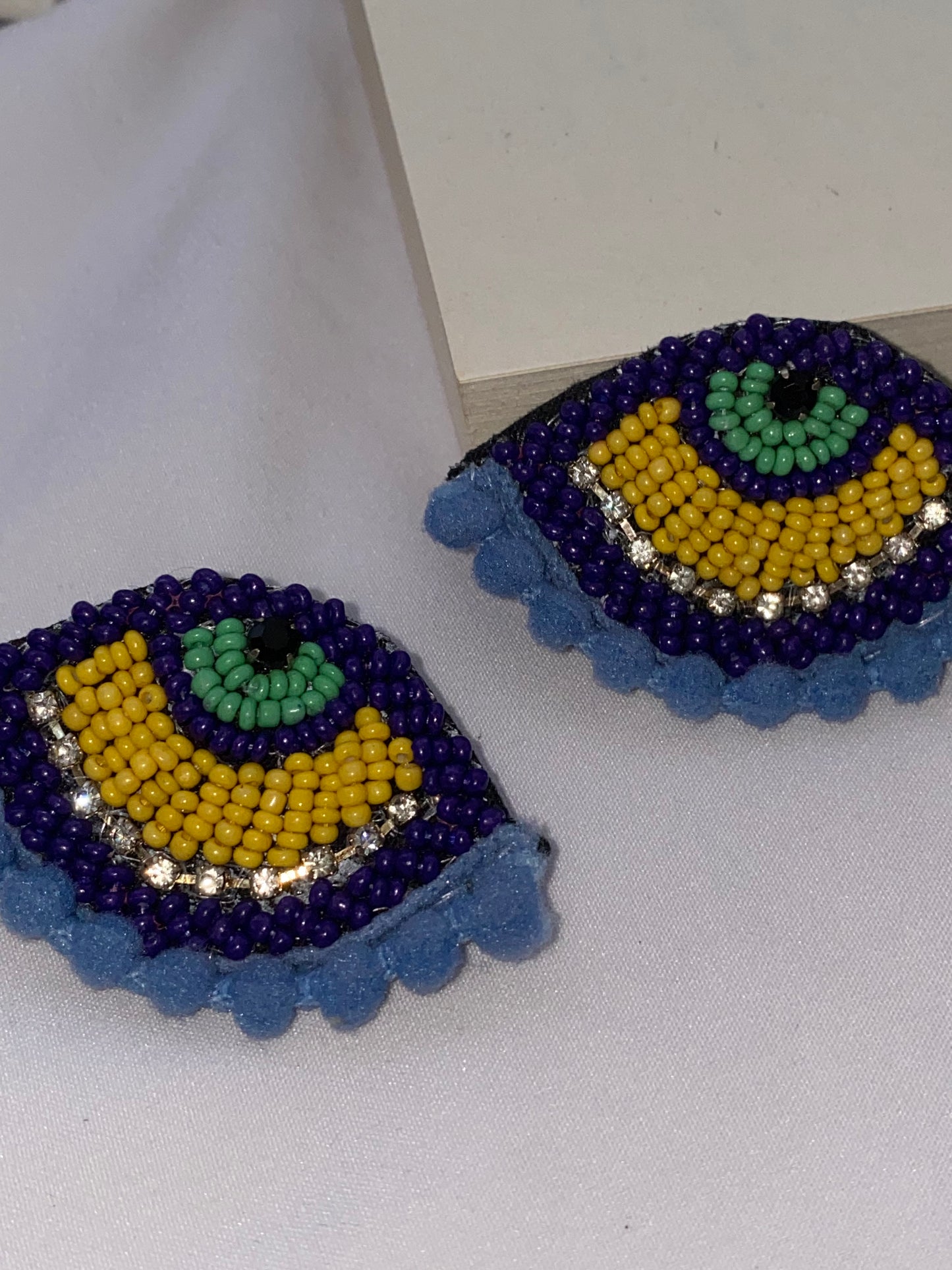 Evil eye statement studs