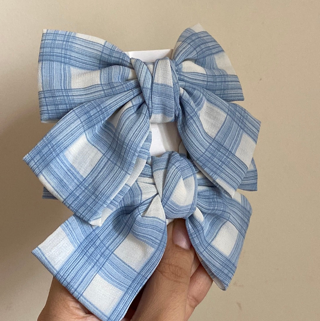 Checkered bow clutch