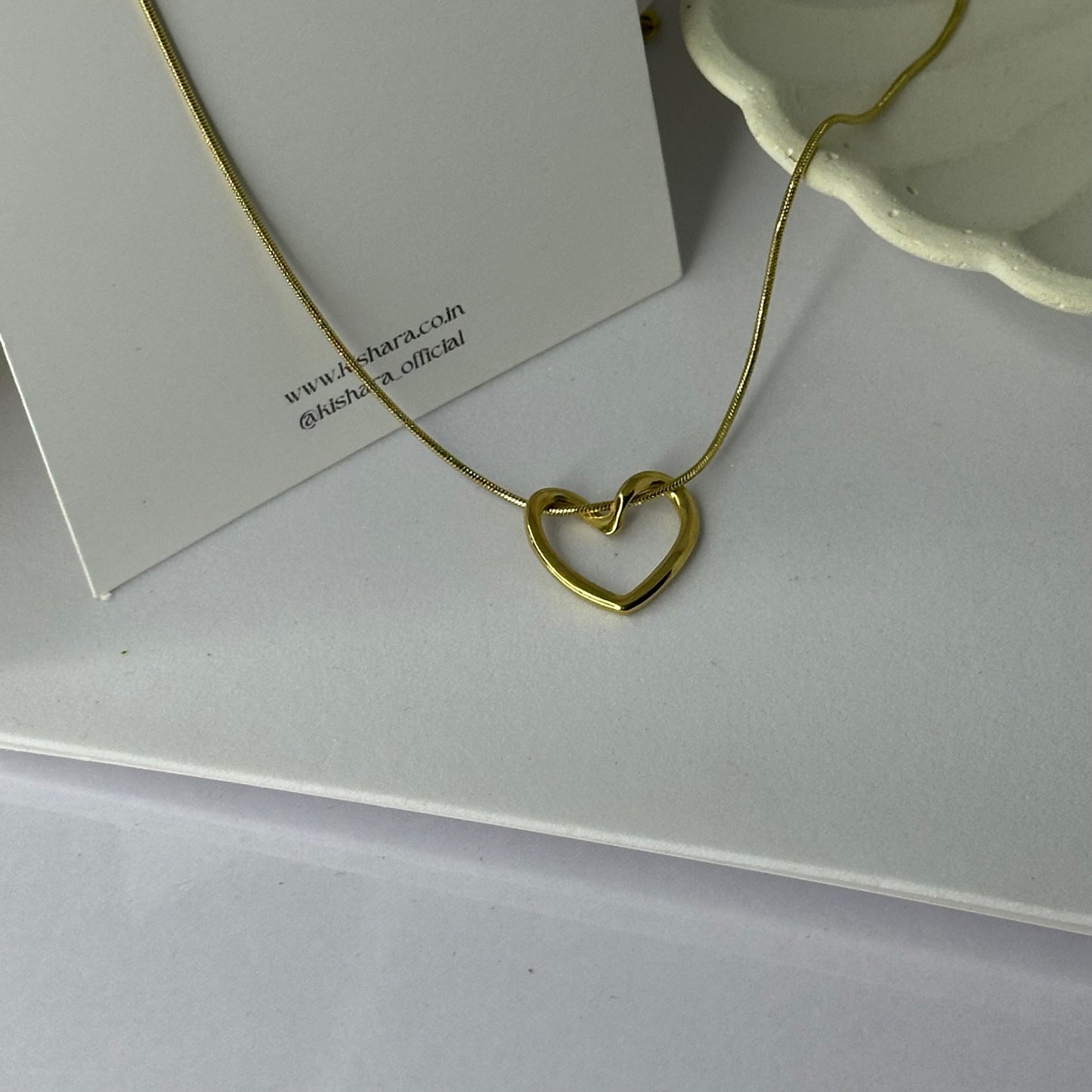 DIZZLE HEART NECKLACE