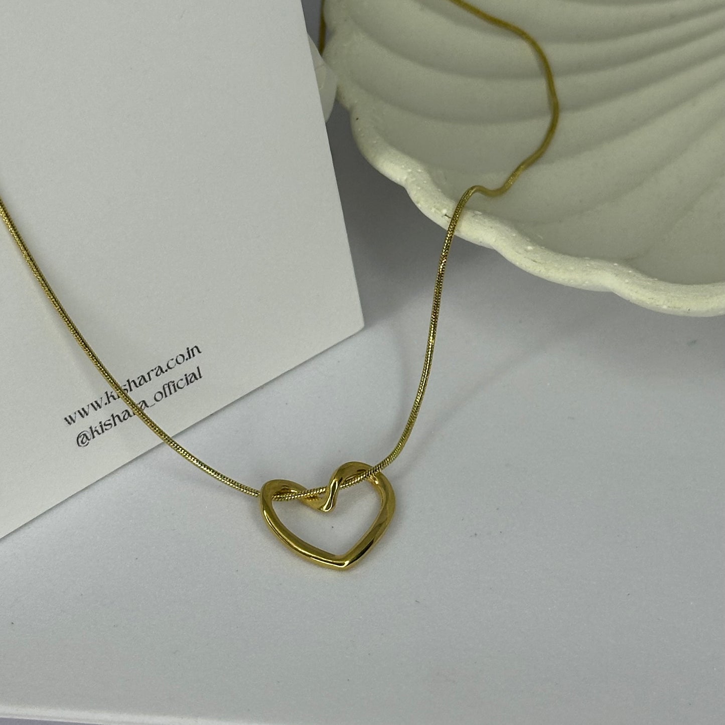 DIZZLE HEART NECKLACE