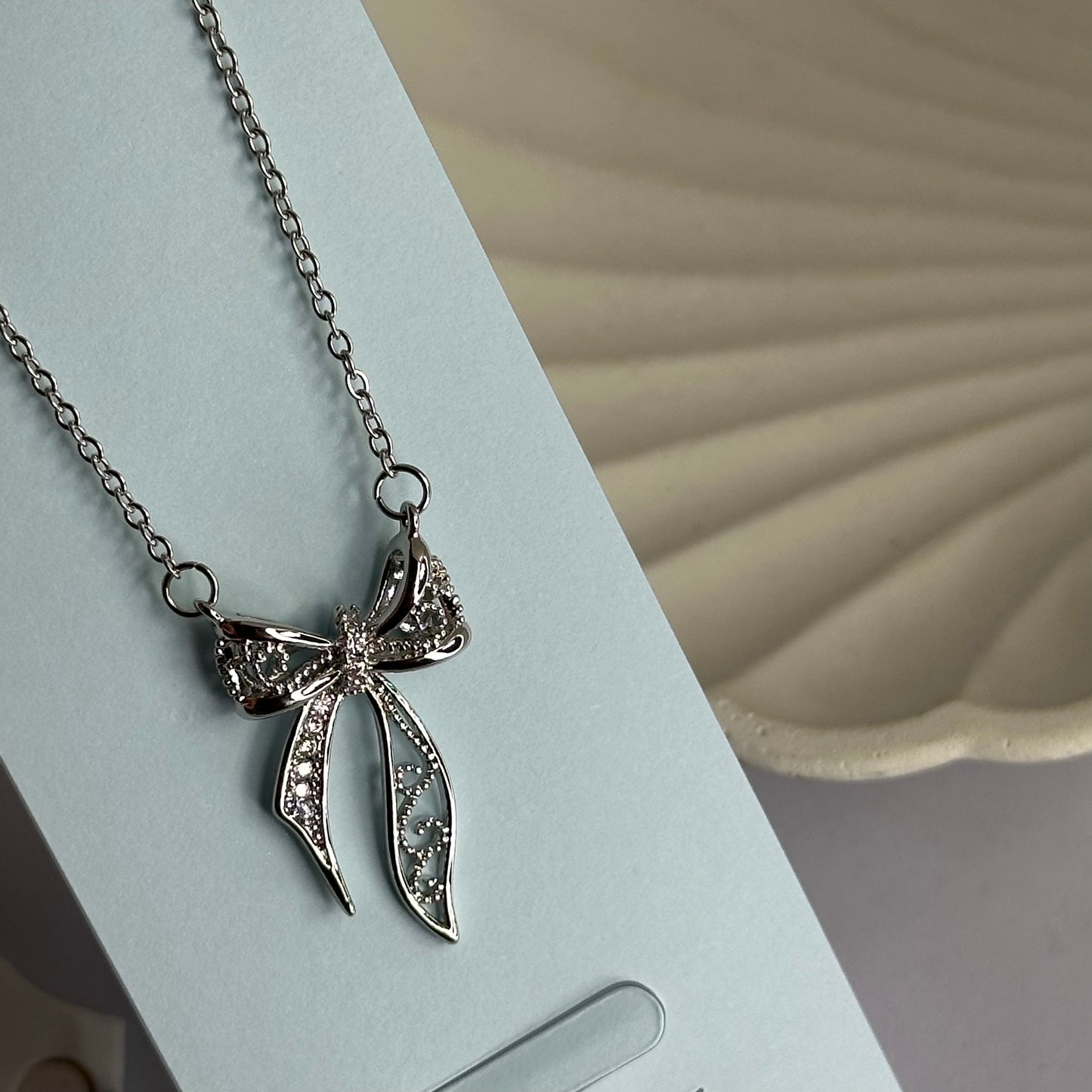 SILVER FAIRY BOW NECKLACE