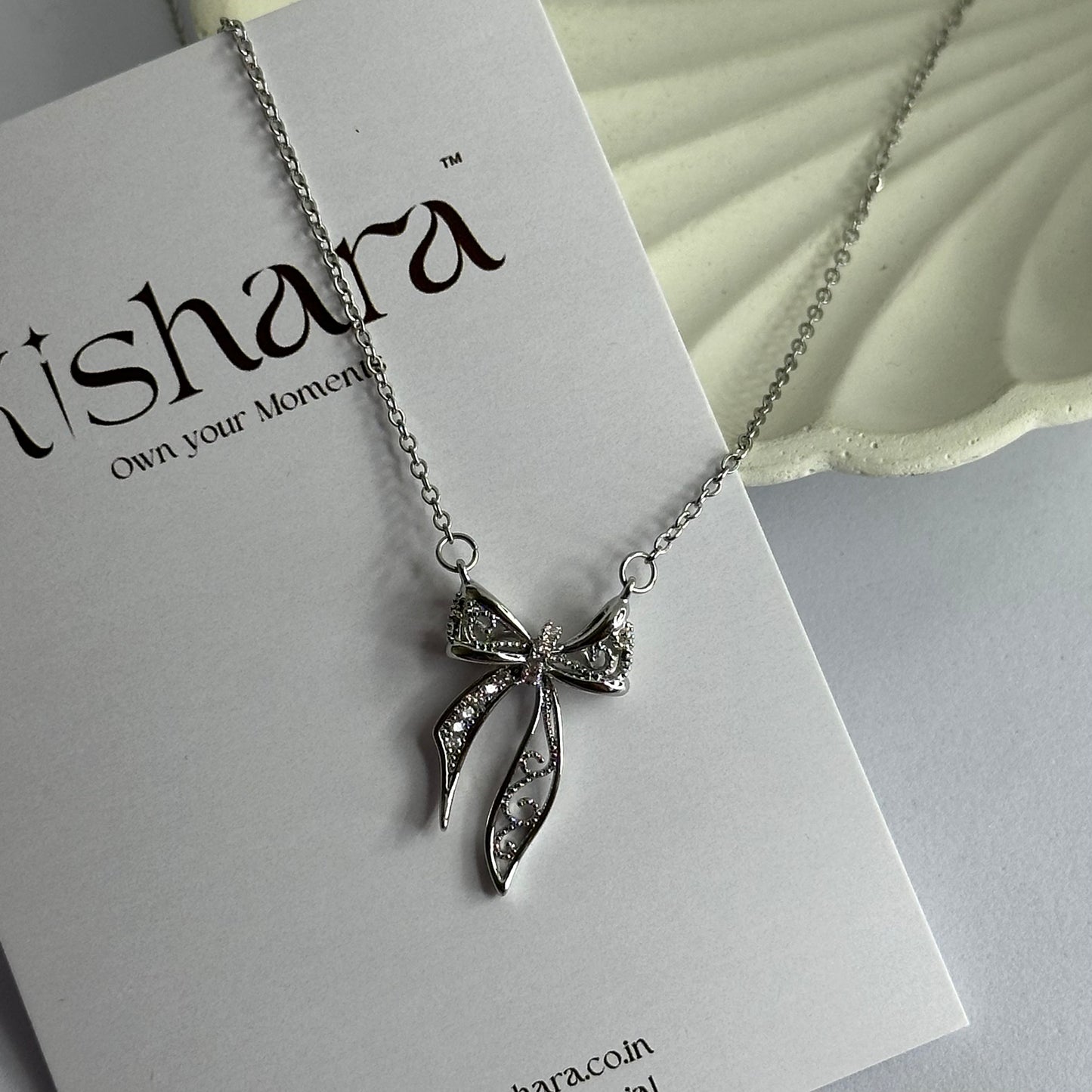 SILVER FAIRY BOW NECKLACE