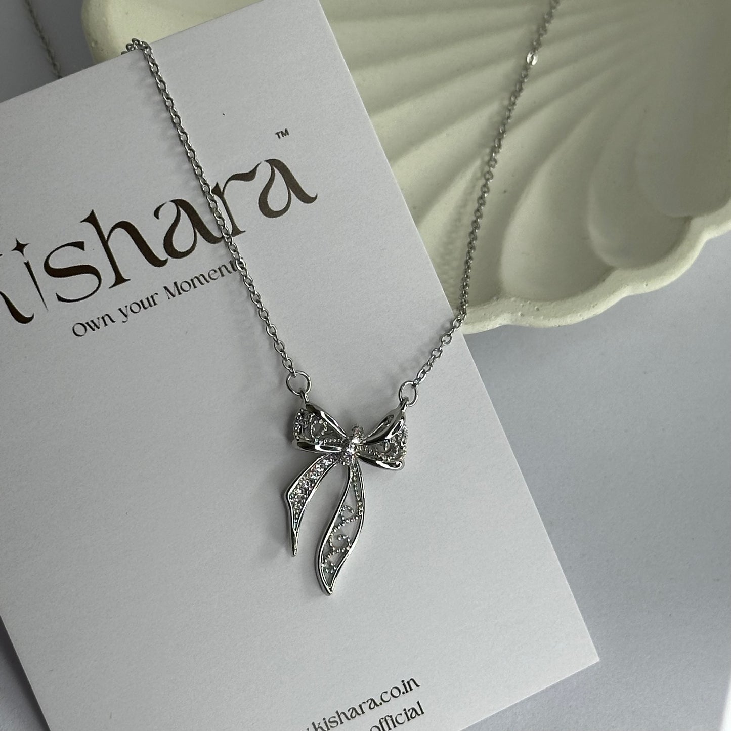 SILVER FAIRY BOW NECKLACE