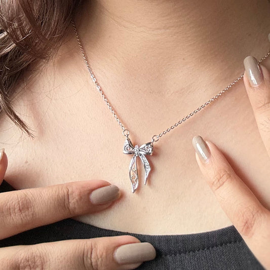 SILVER FAIRY BOW NECKLACE